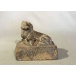 A Chinese grey stone recumbent fo dog, in Sui Dynasty style, 11cm high