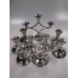 Six dwarf silver candlesticks with weighted bases, and two others plated (8)