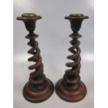 Pair walnut barleytwist candlesticks, 30cm high and a Continental maiolica wall pocket (3)