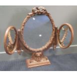 An Edwardian gilt gesso oval dressing table mirror, with ribbon cresting 83cm high