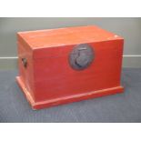 An oriental red lacquered chest, perhaps Korean, and a Tibetan document box, 20th century, painted