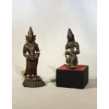 An Indian bronze seated deity, probably Shiva, 9cm (feet lacking, re-glued) and another, standing,