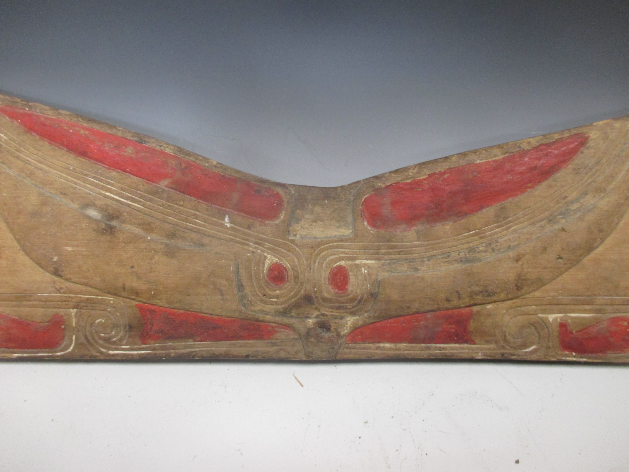 A North American Indian carved and painted pine rest panel, carved in low relief with a stylized - Image 2 of 5