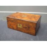 A Victorian walnut and ebony strung writing slope, with brass plaque and monogram BC; and a