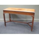 A George III style mahogany slender rectangular table, on moulded legs with shaped stretcher 77 x