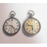 Two base metal military issue open faced pocket watches, one by Cyma, one unsigned