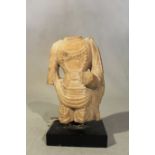 A Chinese white marble fragmentary torso of Avalokiteshvara, in 6th/7th century style, 12.5cm high