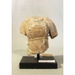 A Chinese grey stone fragmentary torso of Avalokitesvara, in 6th/7th century style, 11cm high