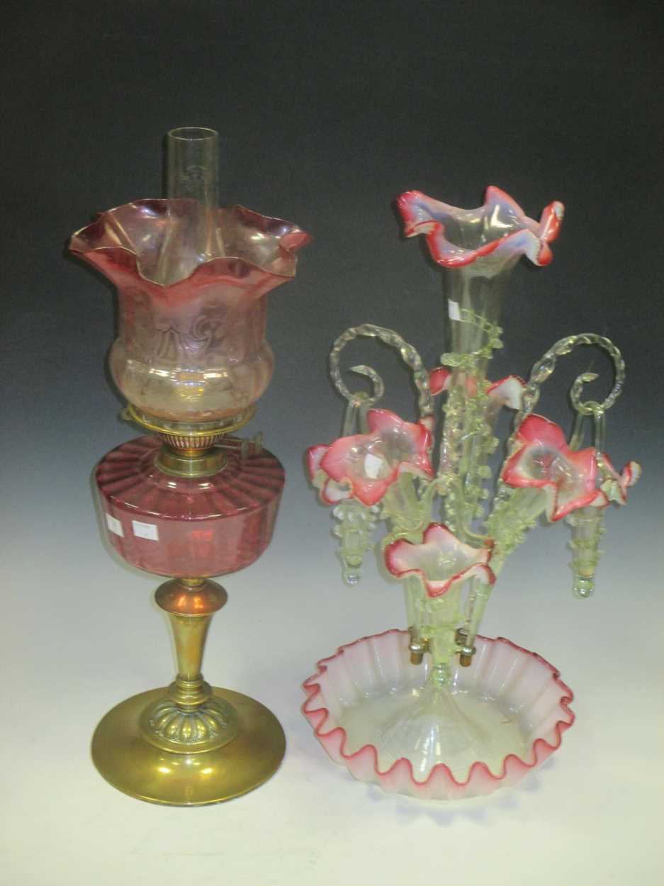 A good Victorian glass epergne and a Cranberry glass and brass oil lamp (2)