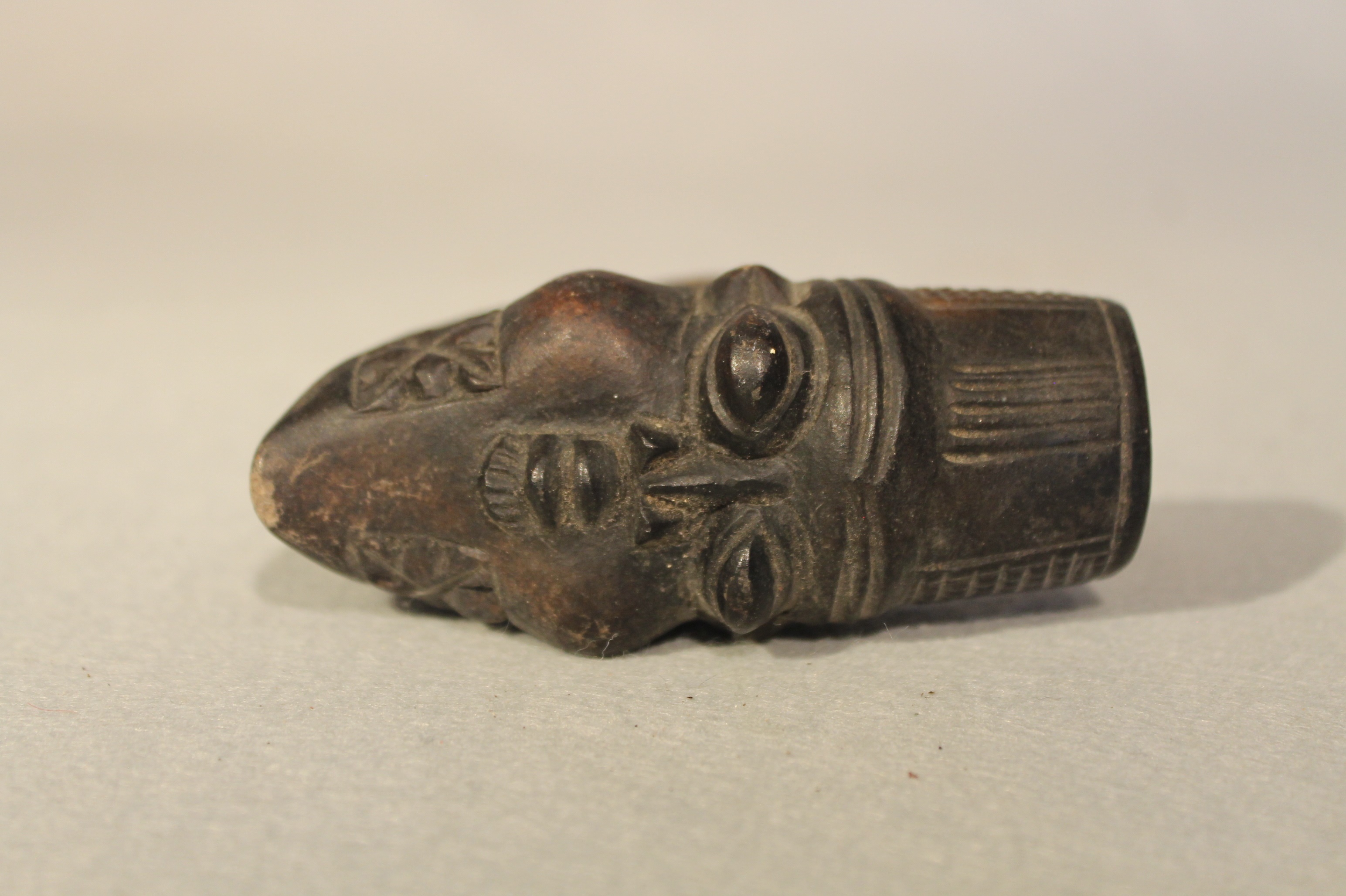 A group of African pottery including Cameroon items, comprising two smoking pipes, 18cm and 10 cm - Image 2 of 9