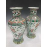 A large pair of Chinese famille verte vases, 43cm high