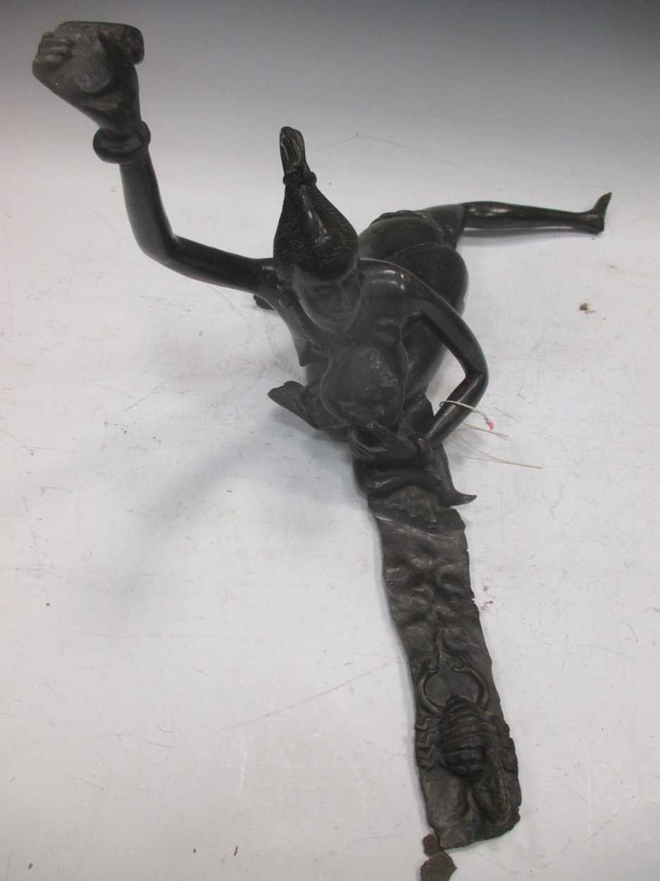 A West African bronze model of a mother and child