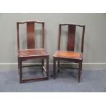 Two Chinese hardwood yoke-back chairs, in Ming style, with solid seats and curved splats, 105cms