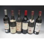 Twelve assorted bottles of red wine, including two bottles of Chateau Chasse Spleen, 1983 and a