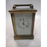 A French brass carriage timepiece
