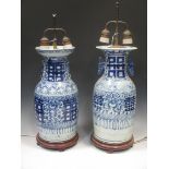 Two Chinese blue and white porcelain decorative vases, Republic Period, as lamps, 41cm and 41.5 cm