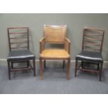 A late 19th century mahogany canned armchair together with a pair of bedroom chairs (3)