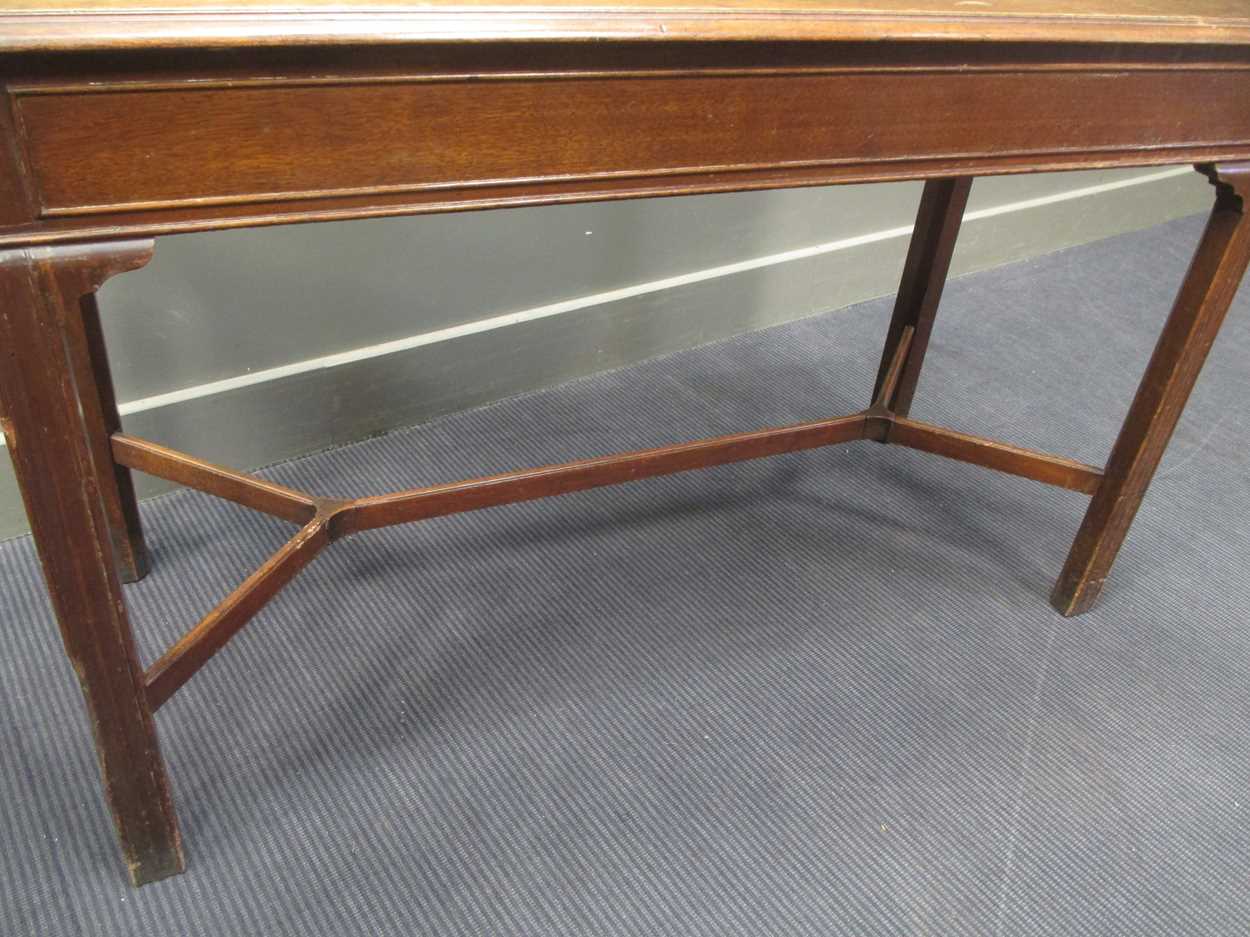 A George III style mahogany slender rectangular table, on moulded legs with shaped stretcher 77 x - Image 7 of 10