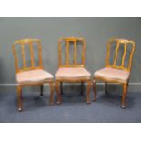 Three Dutch late 18th century or early 19th century floral marquetry side chairs, on cabriole