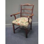 A George III elbow chair of wide proportions 100 x 69 x 66cm