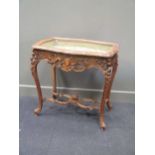 A carved wood display top bijouterie table in the French style 80 x 83 x 48cm
