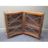 A pair of early 20th century George III style mahogany astragal glazed bookcases, on bracket feet