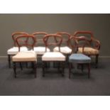 A group of seven Victorian dinning chairs of three differnt designs, one chair with arms (7)