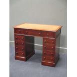 A Victorian mahogany twin pedestal desk of eleven drawers 76 x 95 x 52cm