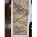 A Chinese scroll painting, Qing Dynasty, depicting scholars in a pavilion in a vast mountain