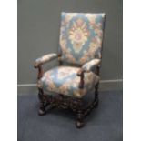 An early 19th century carved walnut upright armchair