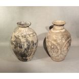 Two Chinese pottery ovoid vases painted with floral devices & leafy flourishes, in Tang style, 31.