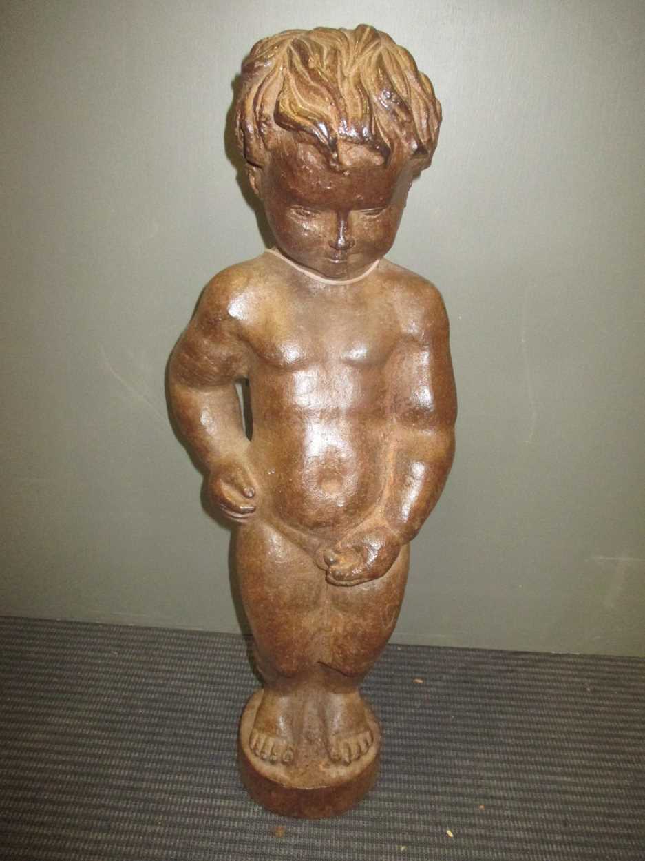 A cast iron figure of Manneken Pis,