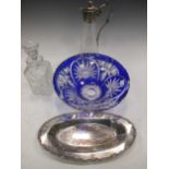An electroplate mounted claret jug, a Bohemian cut glass bowl, another decanter and an