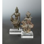 A Chinese bronze figure of Guanyin in seated pose, 15cm, another, 12.5cm, in Song Dynasty style (2)