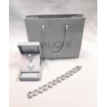 Lalique opalescent glass cross pendant and silver chain with box/bag, together with a modern
