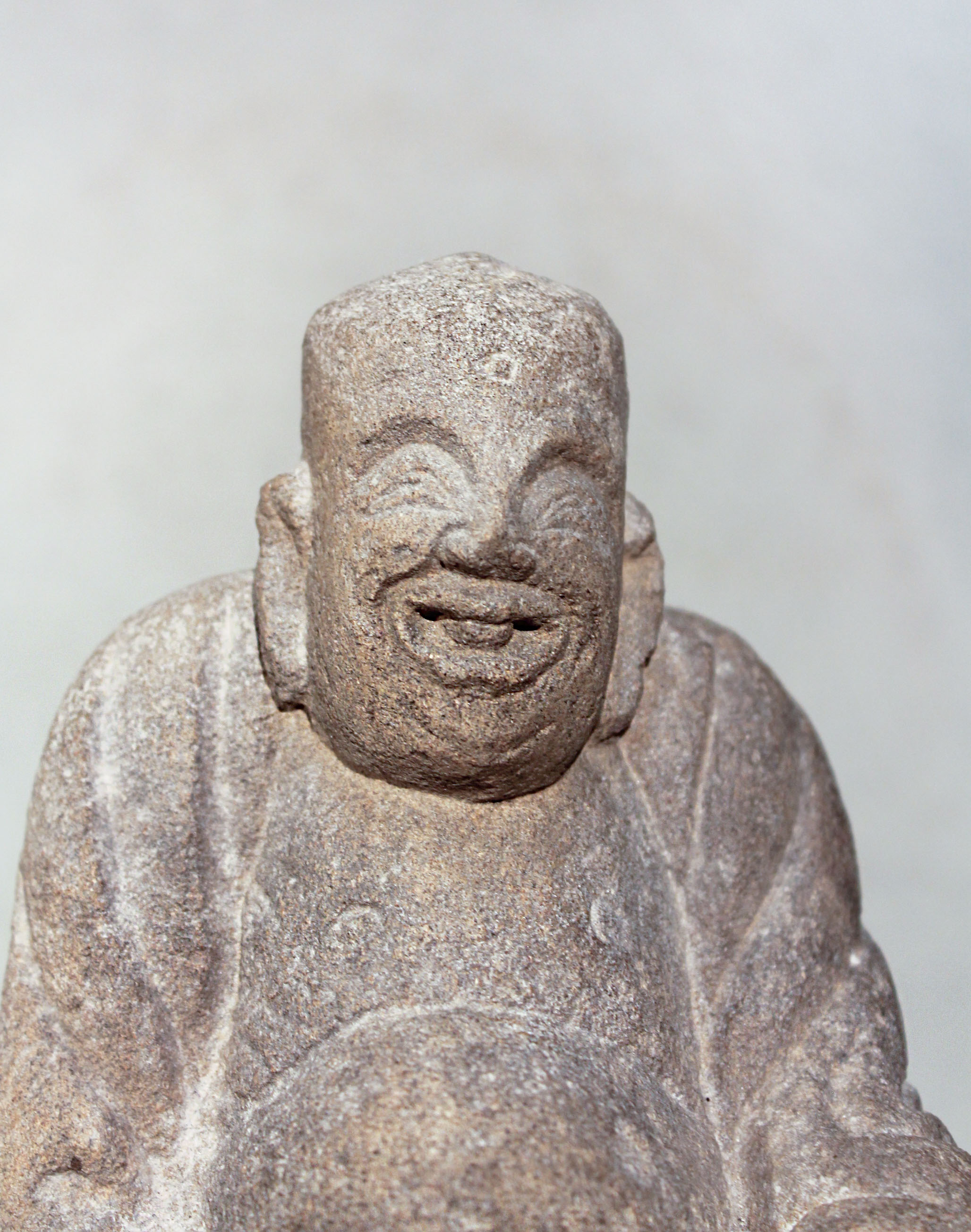 A Chinese cream stone seated figure of a smiling Putai, perhaps late Ming Dynasty, 21cm high - Image 4 of 4