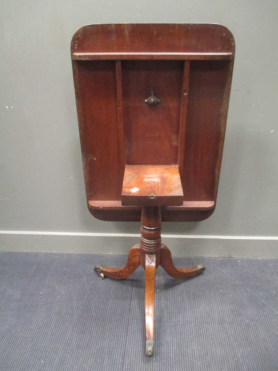 A George III mahogany breakfast table with brass lion paw feet, 72 x 91cm; a 19th century occasional - Bild 12 aus 16