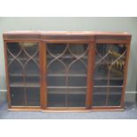 A George III style mahogany breakfront glazed cabinet, 103 x 154cm