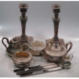 A collection of silver plated items including two 3 piece tea sets, a pair of sauce boats, a