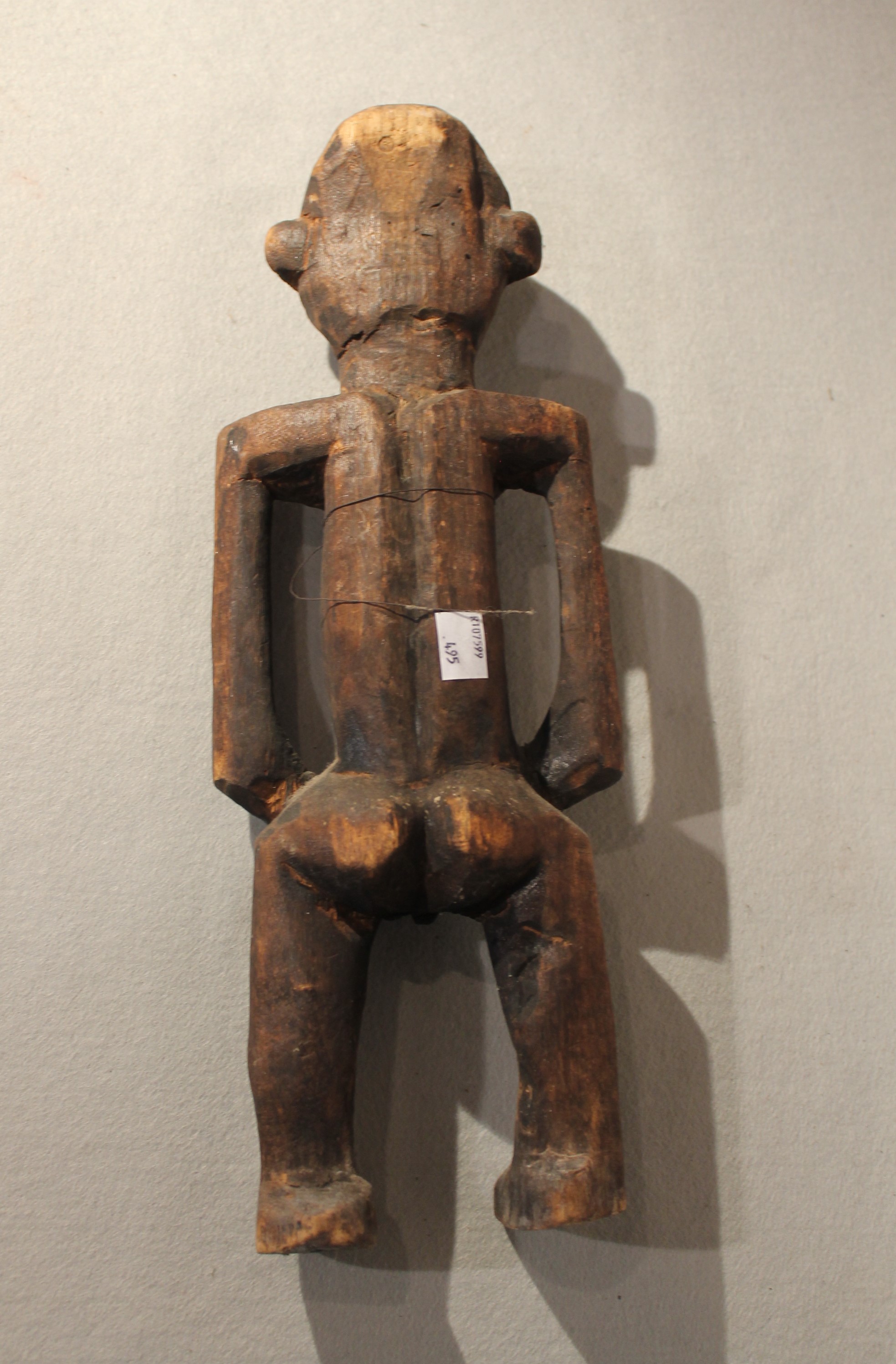 A Naga carved wood squatting figure, and a Cameroon standing figure, both mid 20th century, both - Image 3 of 3