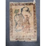 A figural silk rug, possibly Tibetan 79 x 58cm; a signed Persian figural rug, probably silk, 113 x