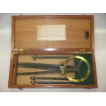 A Hughes & Son brass drawing instrument, mahogany cased