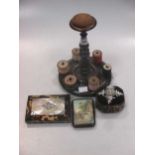 A 19th century treen sewing stand, a faux tortoiseshell pin cushion and a tortoiseshell and mother-