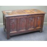 A 17th century oak chest 75 x 134 x 57cm