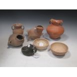 A group of six Chinese neolithic ceramic vessels, including a red pottery two-handles jar, Siwa