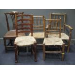 Four country rush seated chairs, 19th century and an oak single chair (5)