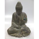 A wooden buddha, 20th century, 38cm high