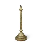An Eastern brass standard lamp,