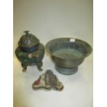 A bronze bowl (possibly Chinese) and an enamelled incense burner and cover on fabric stand