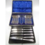 Cased silver handle knives; 12 plated spoons and tongs (cased)